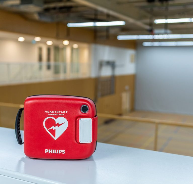Philips Heartstart HS1 defibrillator in its case
