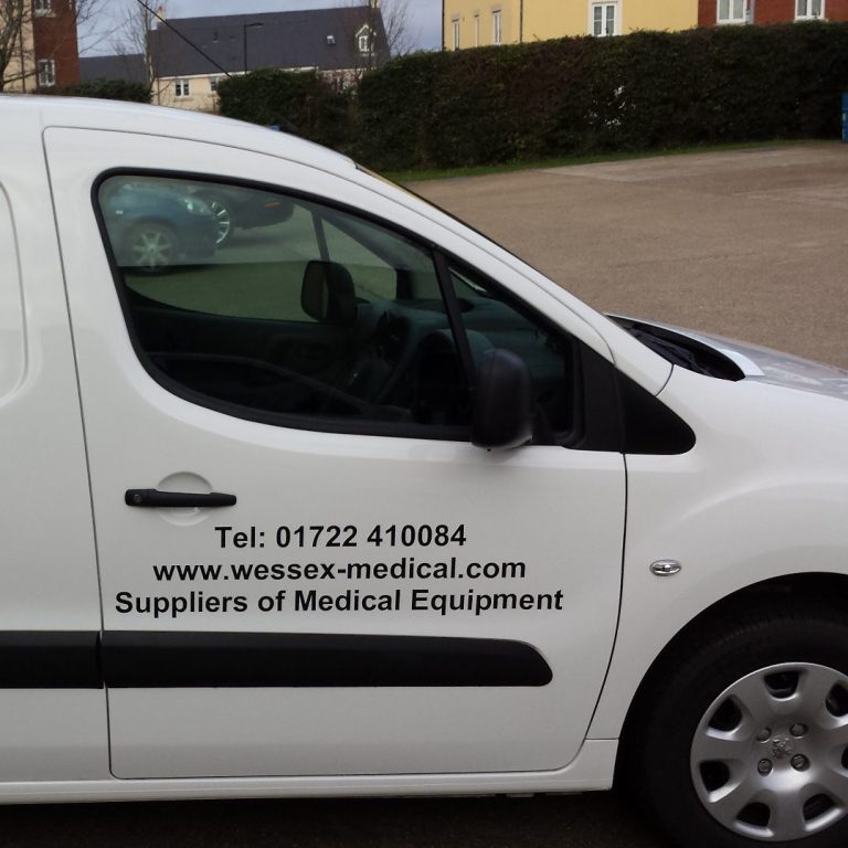 Side view of the Wessex Medical Van showing their address details